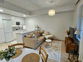Stylish top floor ap, with private parking